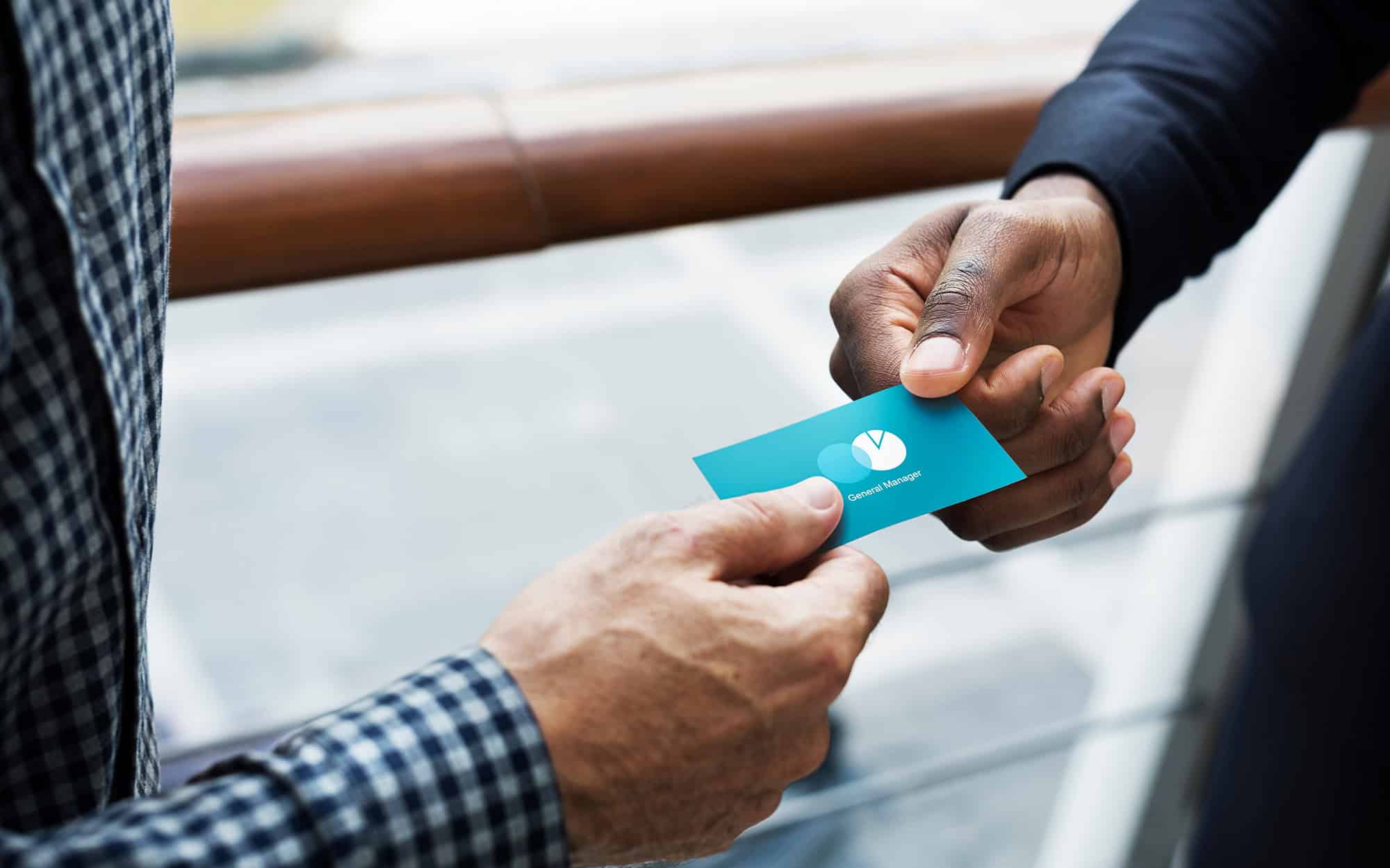 Side View Of Someone Being Handed A Credit Card