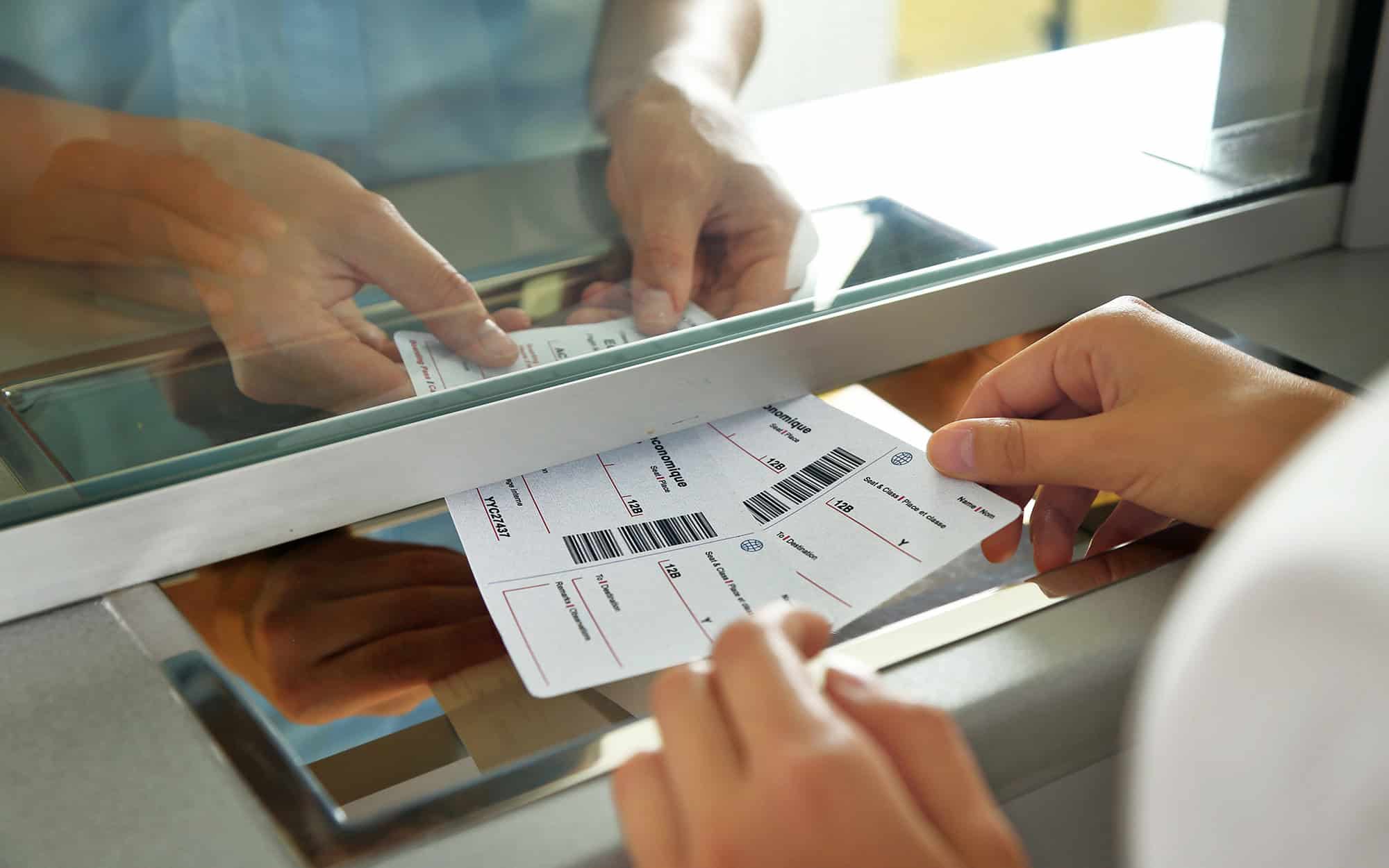 Woman Buying Tickets At Box Office